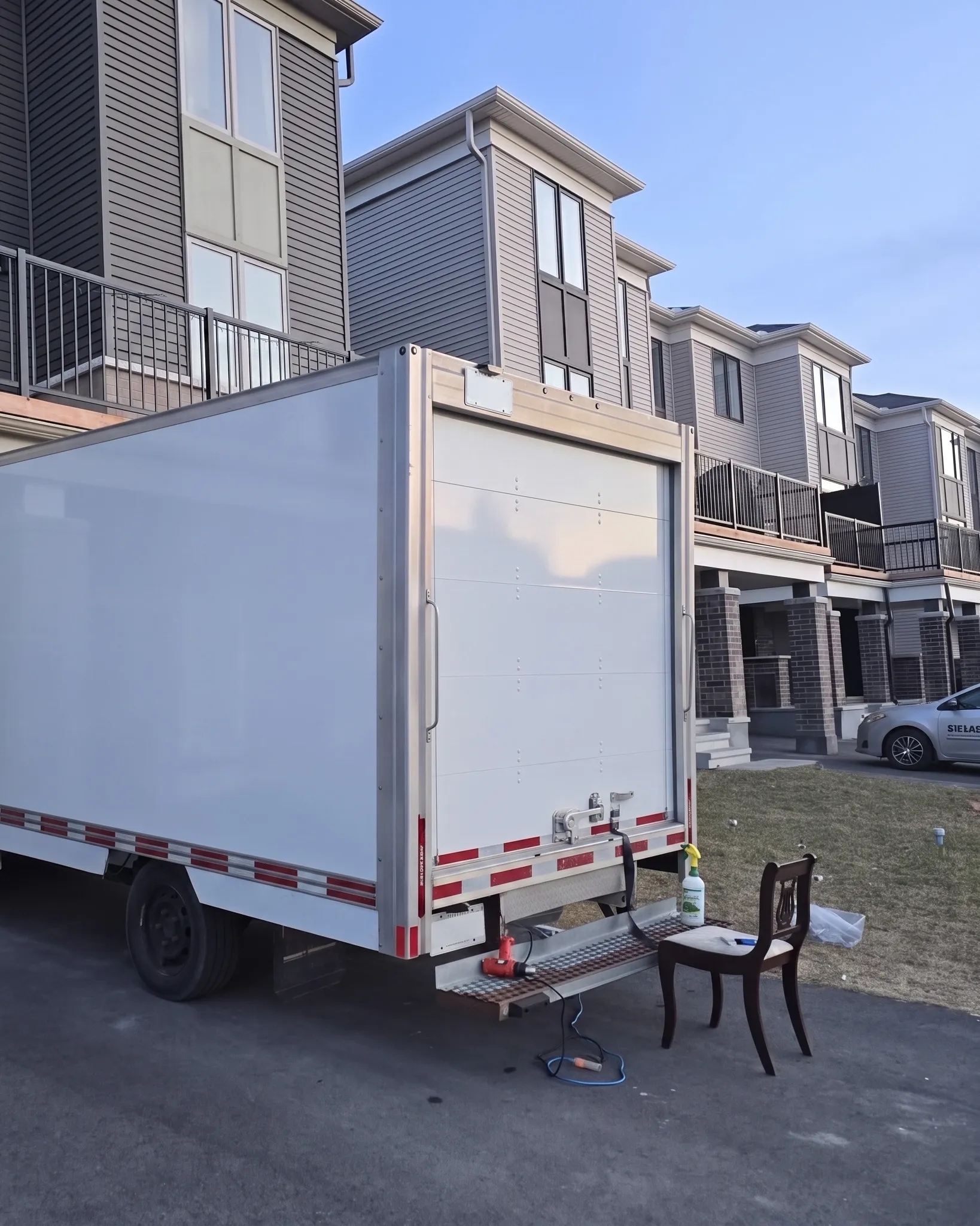 Bare white cube van box before the printed wrap was applied